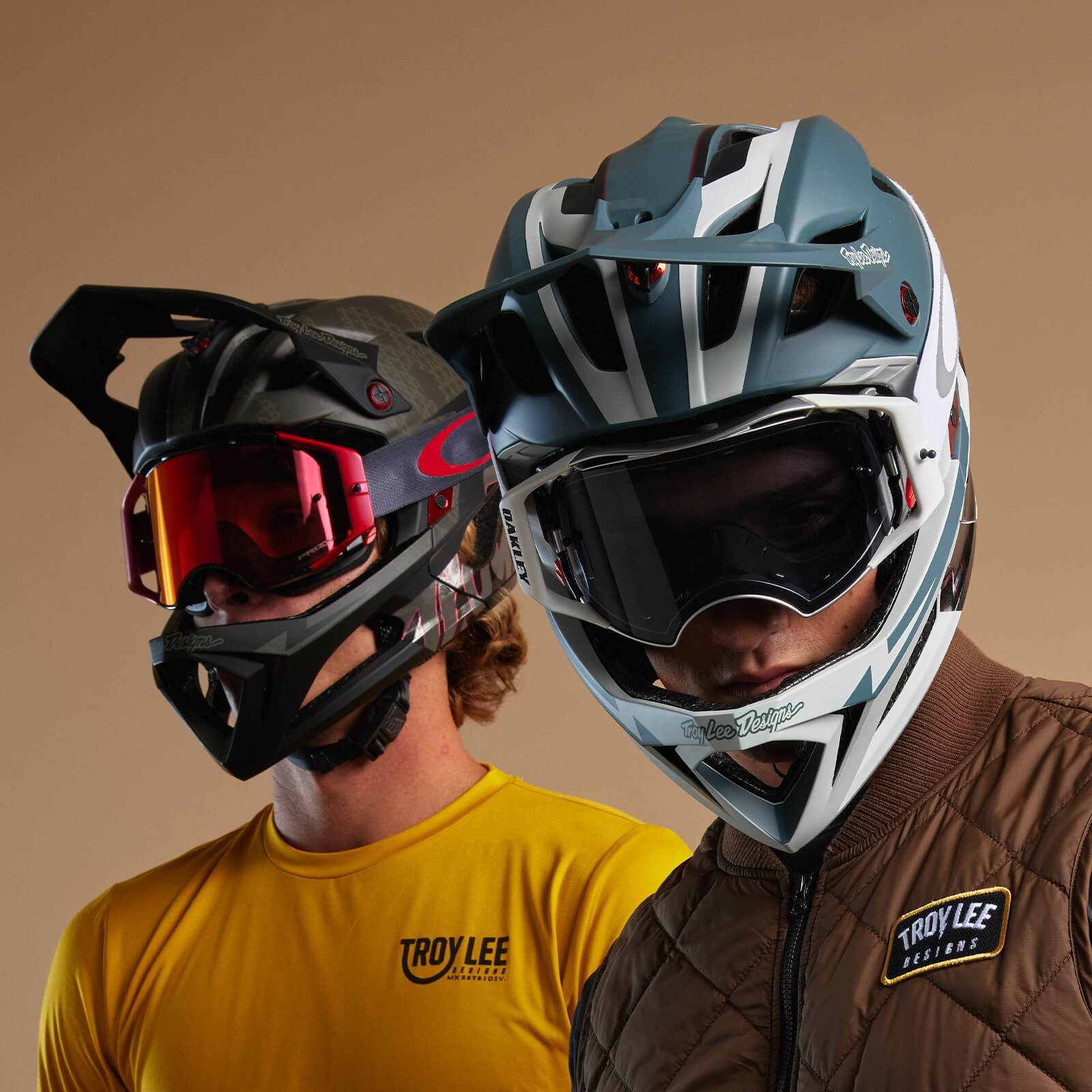 Two riders wearing the new TLD Stage Mountain Bike Helmets